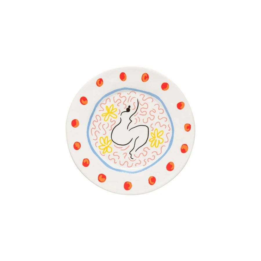 assiette à dessert originale avec le dessin d'une femme et des couleurs estivales jaune, orangée