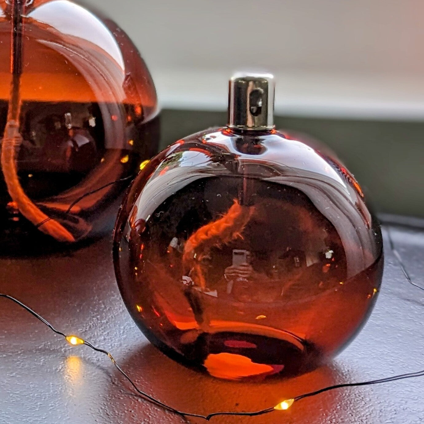 petite sphère à huile en verre transparent orange taille S