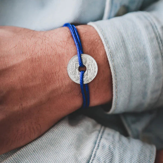 bracelet cordon bleu foncé avec la pièce de monnaie le sou français
